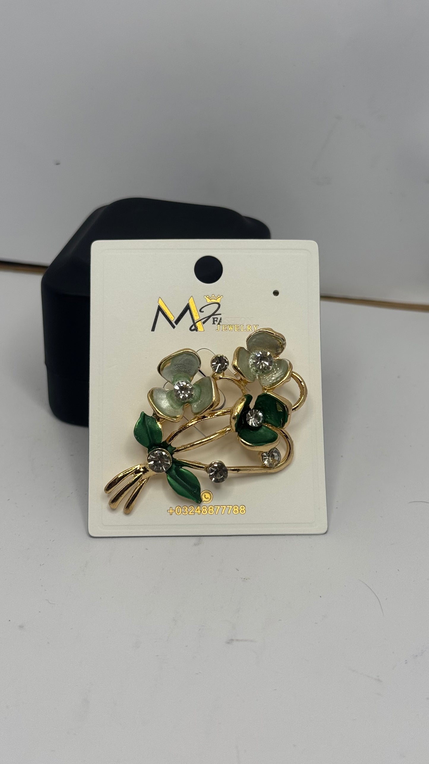 Elegant Floral Brooch with Green and White Stones - Glimzie