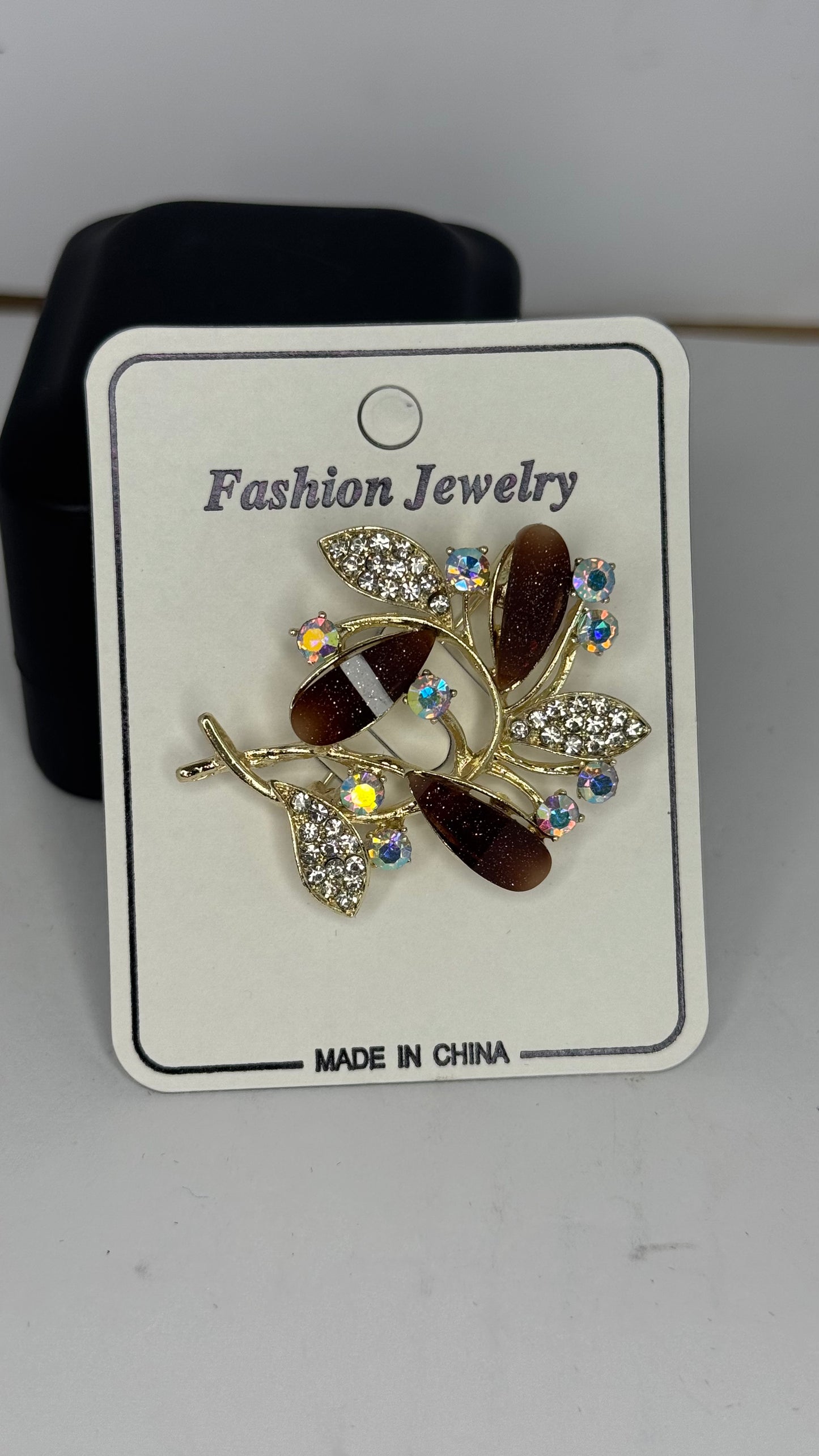 Elegant Brown Leaf Brooch with Crystal Accents - Glimzie