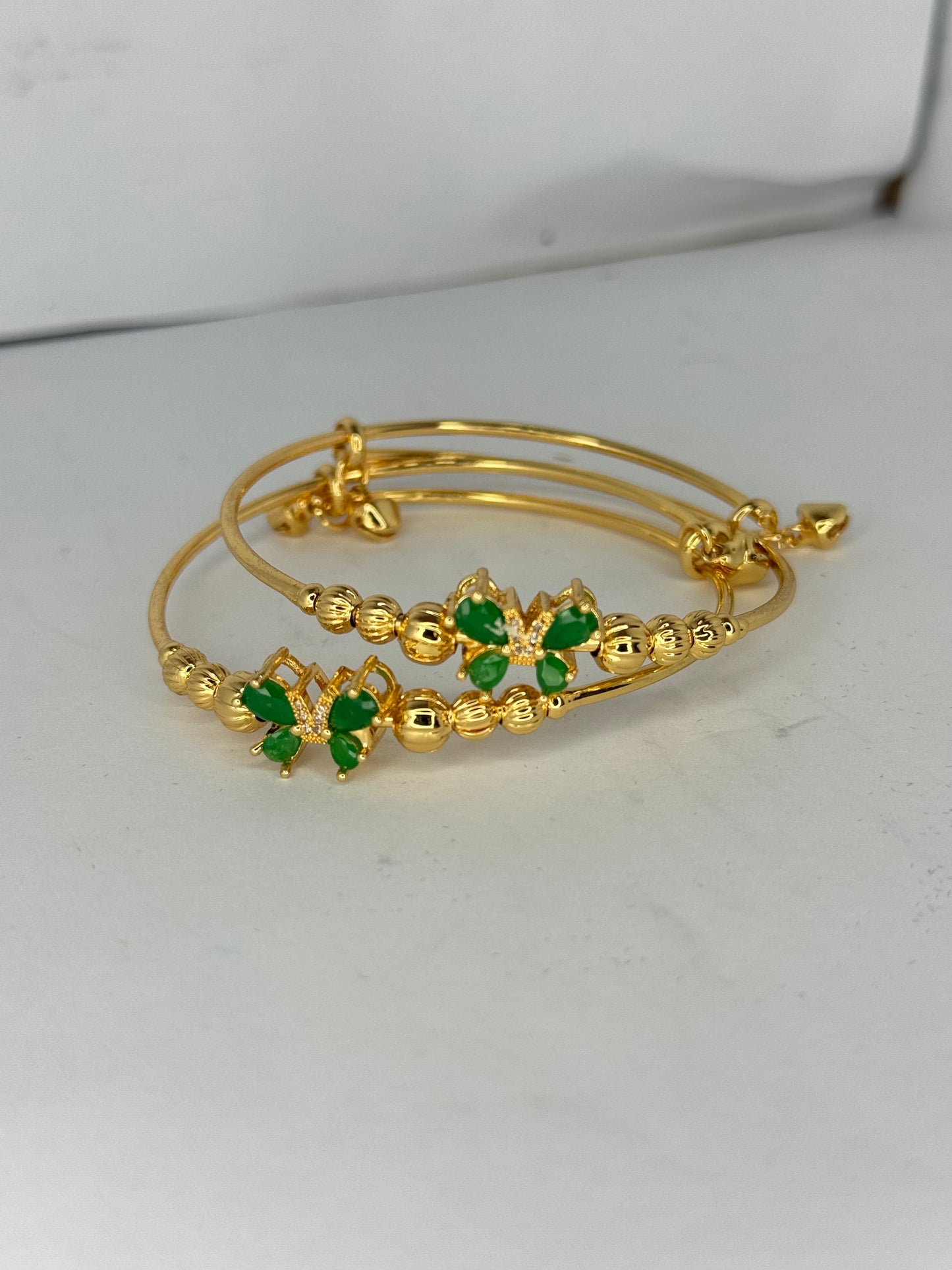 Elegant Gold Plated Green Stone Bangles – Butterfly Design (Set of 2) - Glimzie