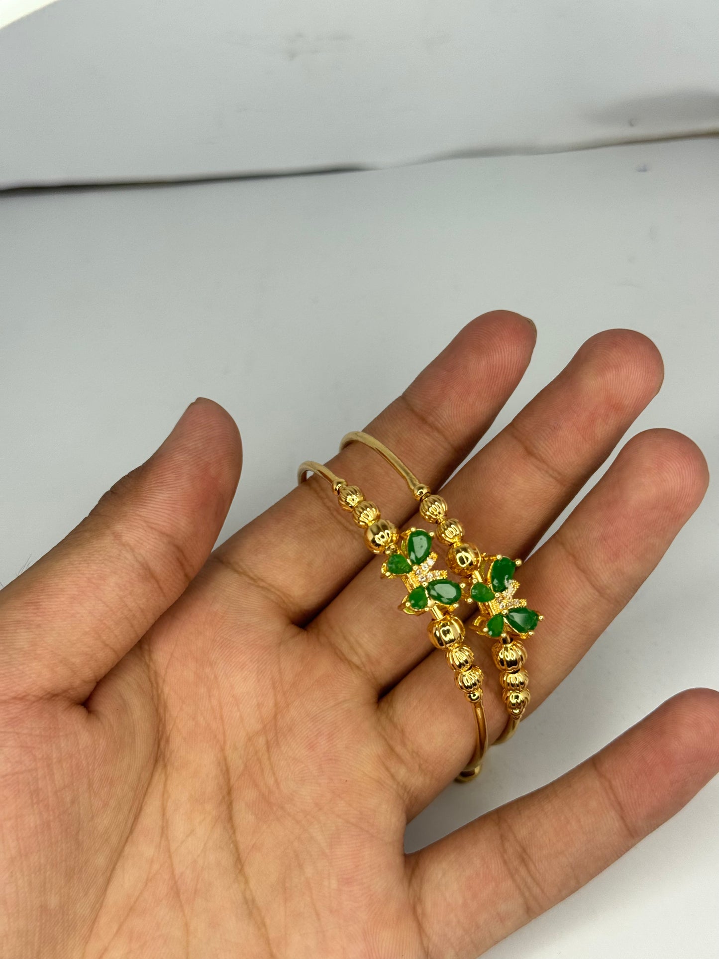 Elegant Gold Plated Green Stone Bangles – Butterfly Design (Set of 2) - Glimzie