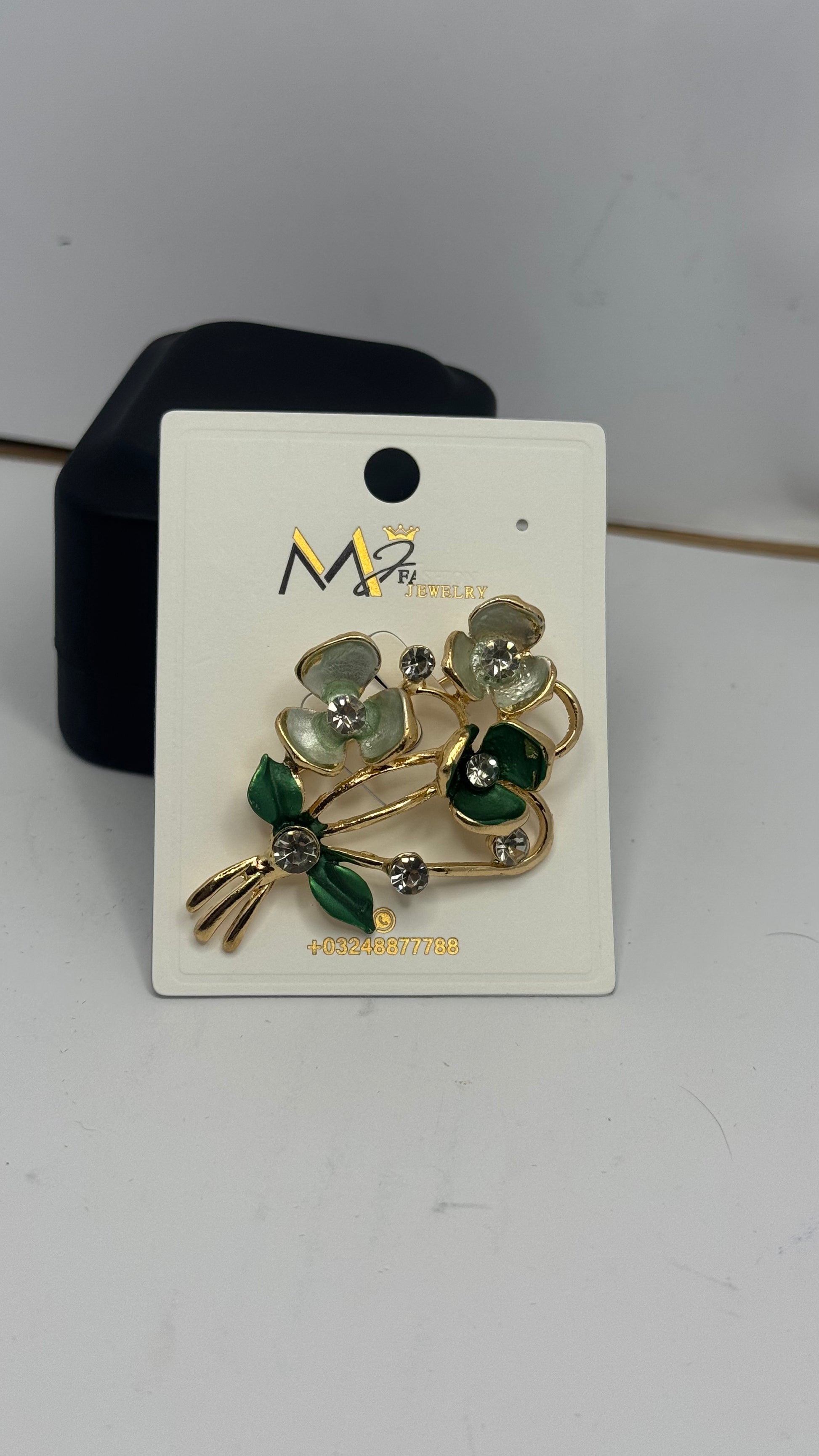 Elegant Floral Brooch with Green and White Stones - Glimzie