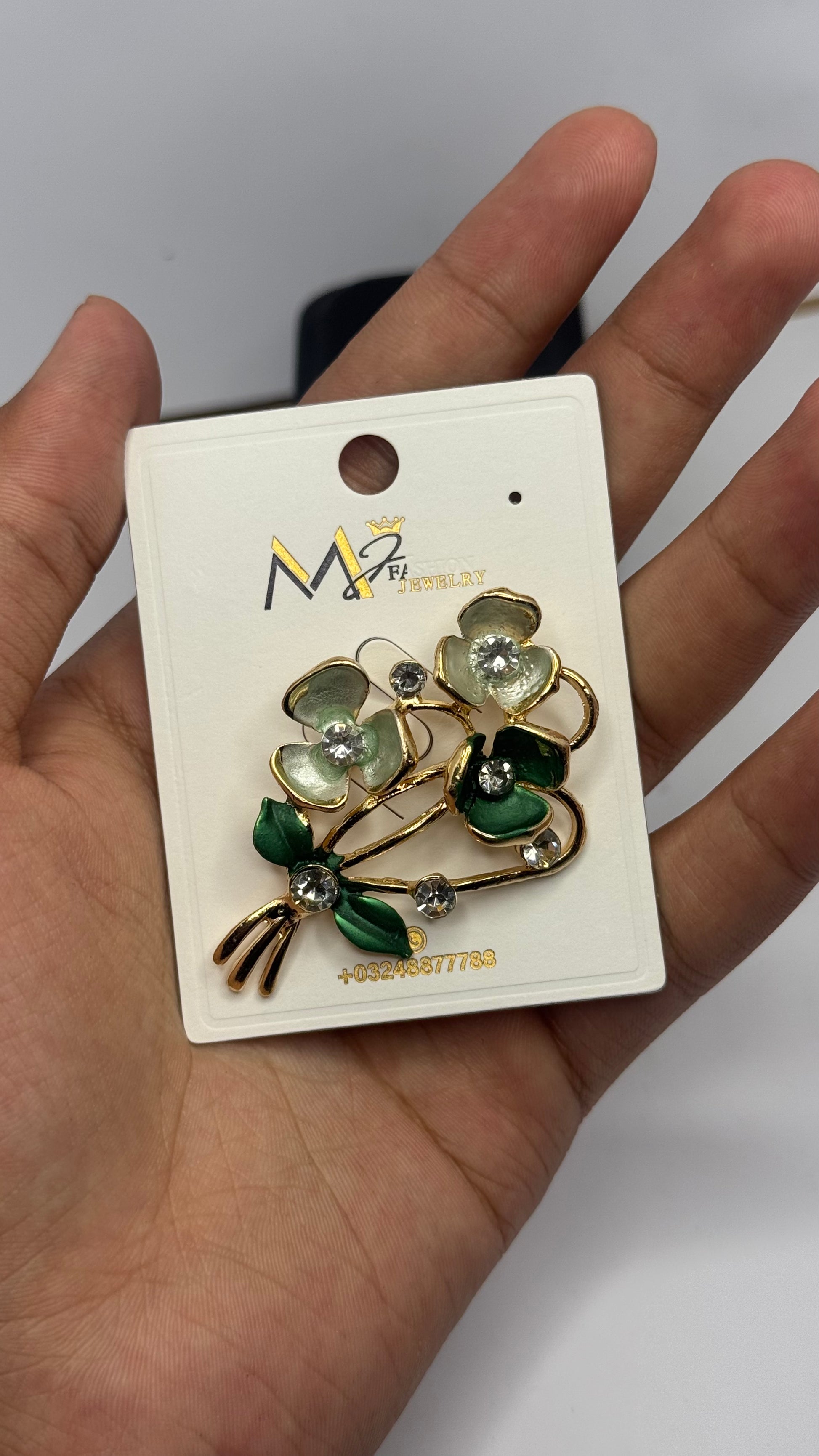 Elegant Floral Brooch with Green and White Stones - Glimzie
