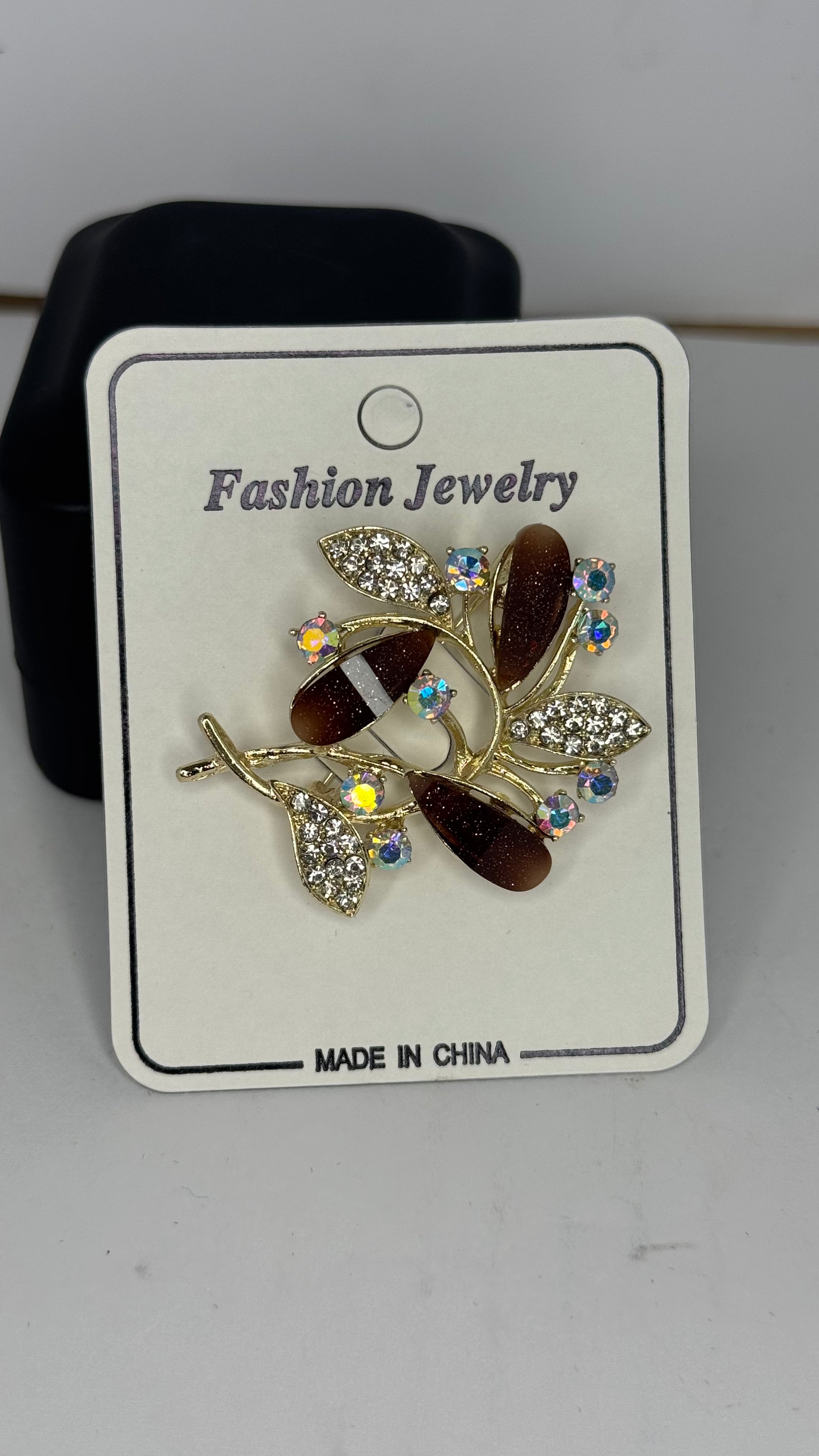 Elegant Brown Leaf Brooch with Crystal Accents - Glimzie