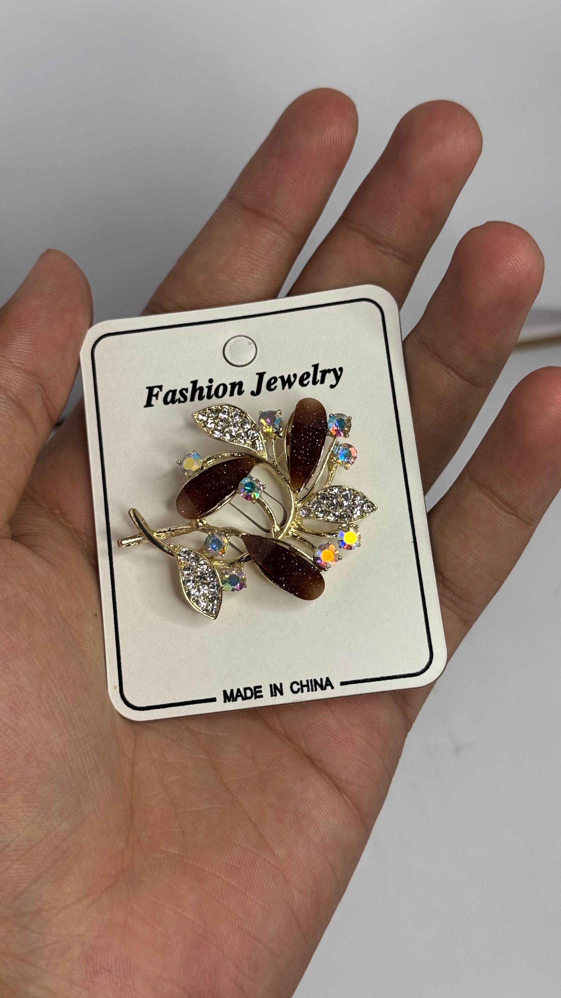 Elegant Brown Leaf Brooch with Crystal Accents - Glimzie