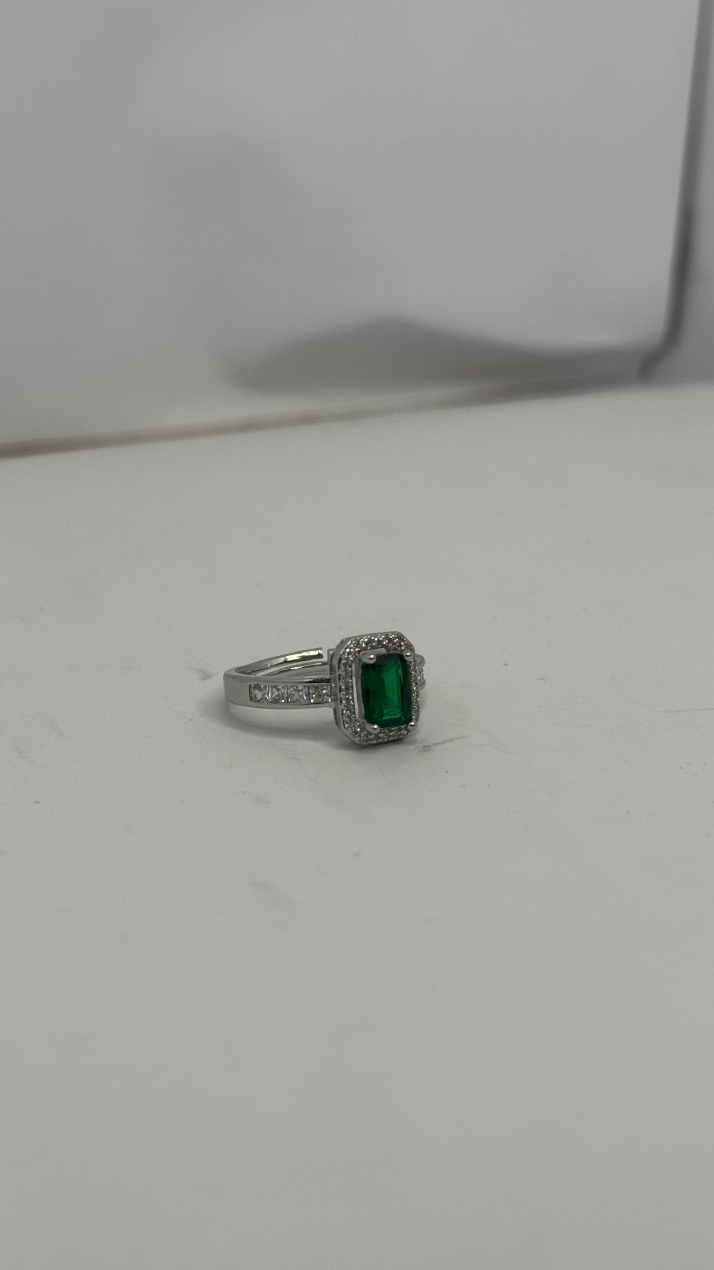 Elegant Silver-Plated Ring with Emerald Green Center Stone – Classic Halo Design - Glimzie