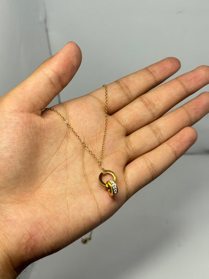 Elegant Interlocking Gold-Tone Pendant Necklace with Crystal Detailing - Glimzie