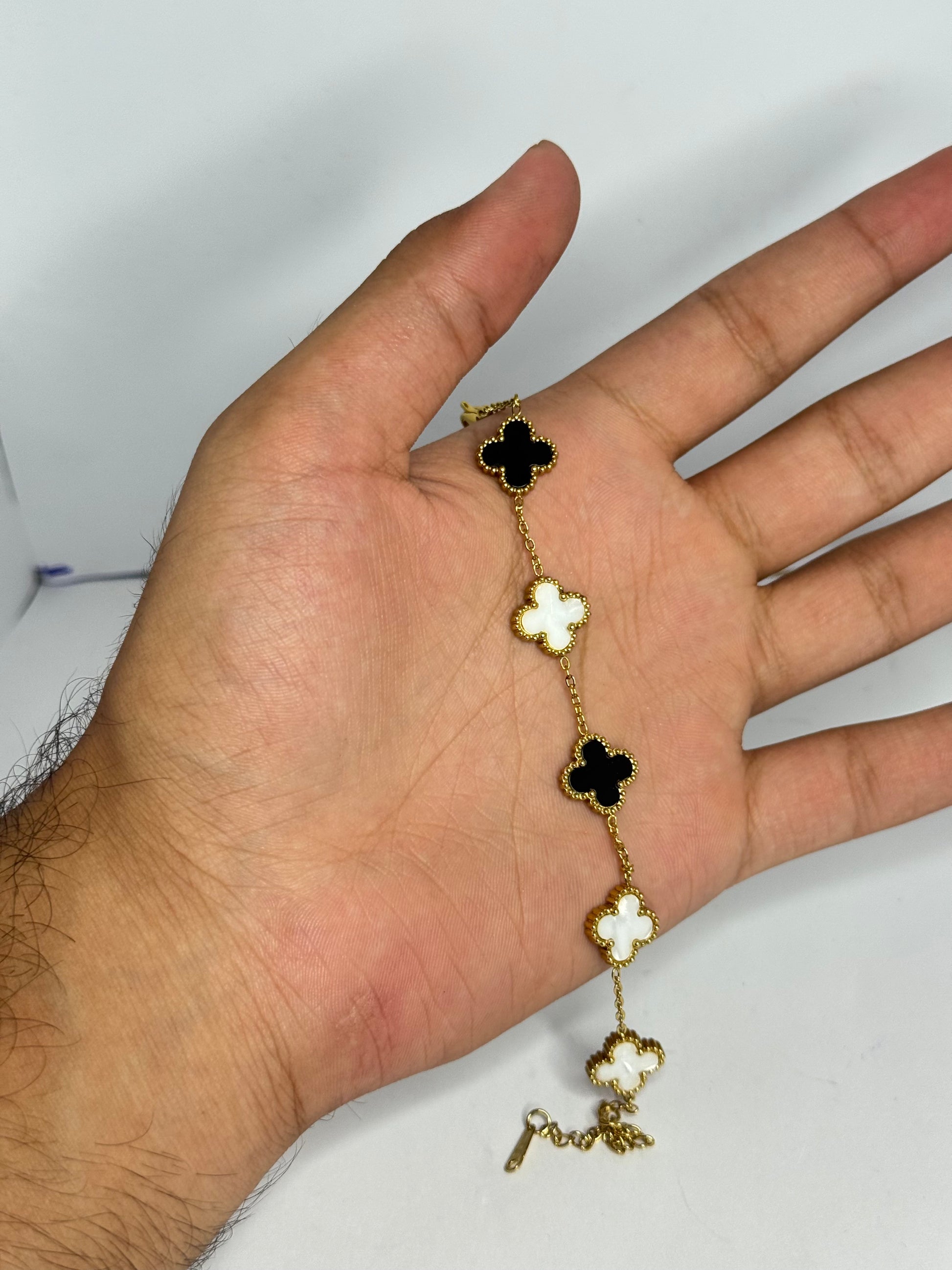 Elegant Black & White Clover Charm Bracelet – Gold Plated - Glimzie